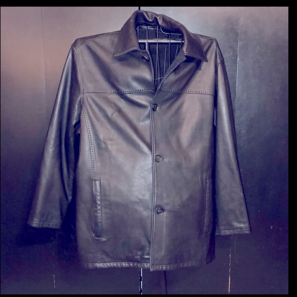 Reversible Andrew Marc leather coat.